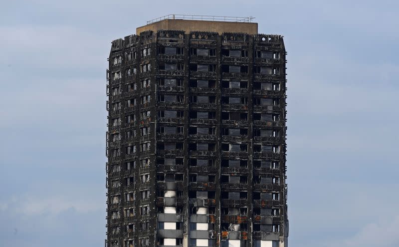 FILE PHOTO: The burnt out remains of the Grenfell apartment tower is seen in North Kensington, London, Britain