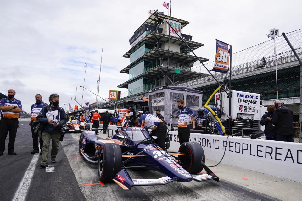 Takuma Sato, of Japan, sits in his car before the start of the final practice for the Indianapolis 500 auto race at Indianapolis Motor Speedway in Indianapolis, Friday, May 28, 2021. (AP Photo/Michael Conroy)