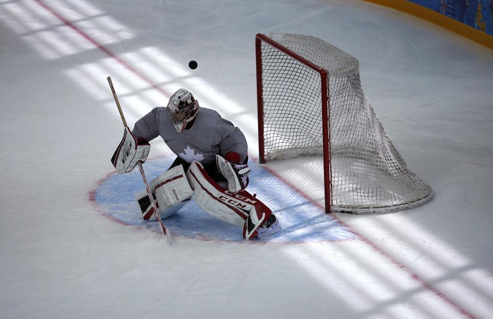Canada's men's ice hockey team goalie Carey Price takes part in a team practice at the 2014 Sochi Winter Olympics, February 22, 2014. REUTERS/Jim Young (RUSSIA - Tags: SPORT OLYMPICS ICE HOCKEY)