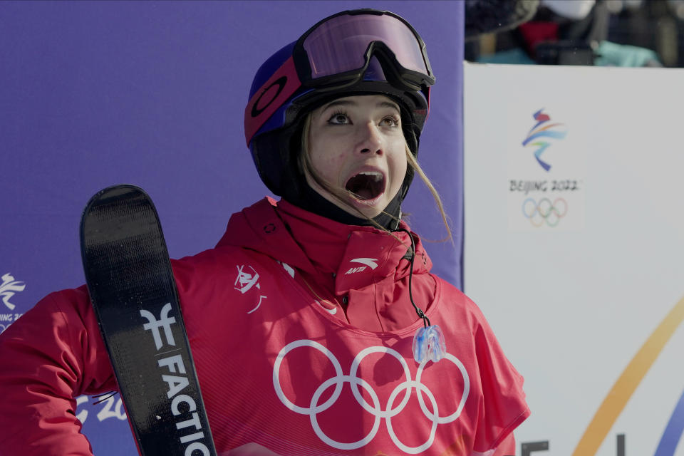 China's Eileen Gu reacts during the women's halfpipe finals at the 2022 Winter Olympics, Friday, Feb. 18, 2022, in Zhangjiakou, China. (AP Photo/Lee Jin-man)