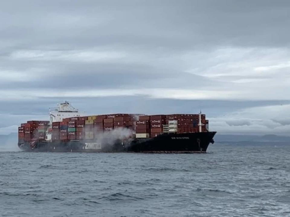 The Canadian Coast Guard says it received a call around 11 a.m. PT on Saturday about a fire that had broken out on two of the damaged containers on board the container ship Zim Kingston. (Canadian Coast Guard - image credit)