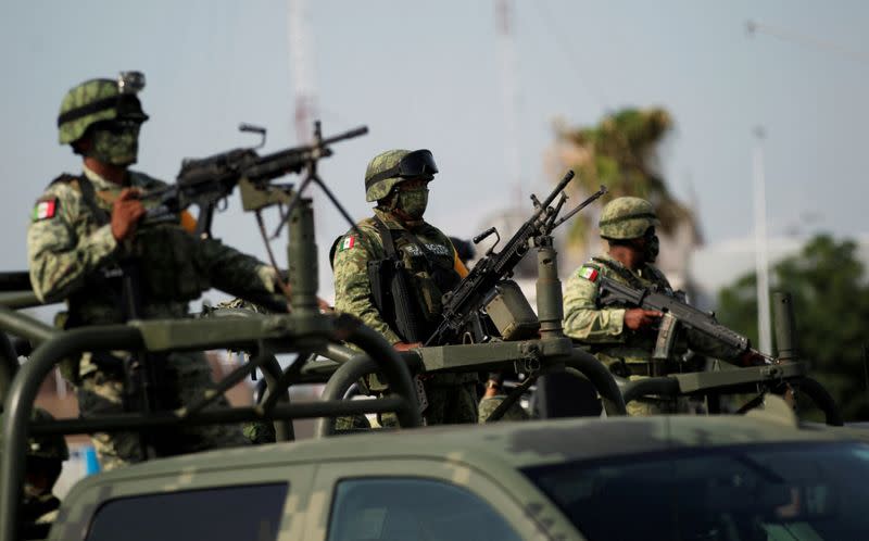 FILE PHOTO: Soldiers, police officers and members of the National Guard the area during a security operation in Sabinas Hidalgo