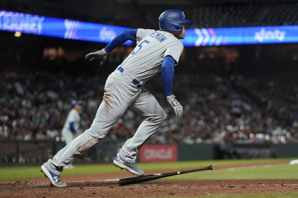 Los Angeles Dodgers' Freddie Freeman watches his RBI single during the ninth inning of a baseball game against the San Francisco Giants in San Francisco, Monday, Aug. 1, 2022. (AP Photo/Jeff Chiu)