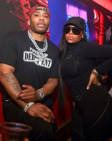 <p>Prince Williams/WireImage</p> Nelly and Ashanti in May 2023