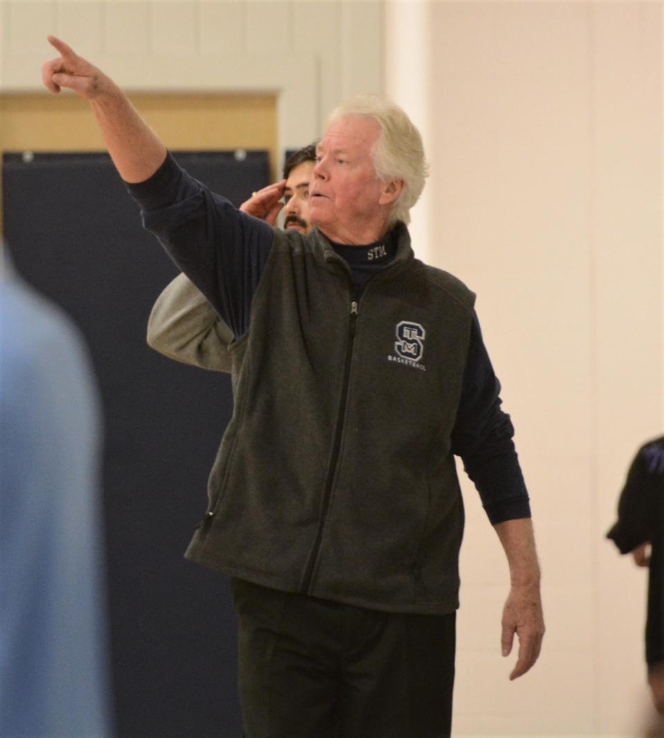 St. Thomas More boys basketball coach Jere Quinn directs his team during the Thomas Konchalski Foundation fundraiser Tuesday in Oakdale.