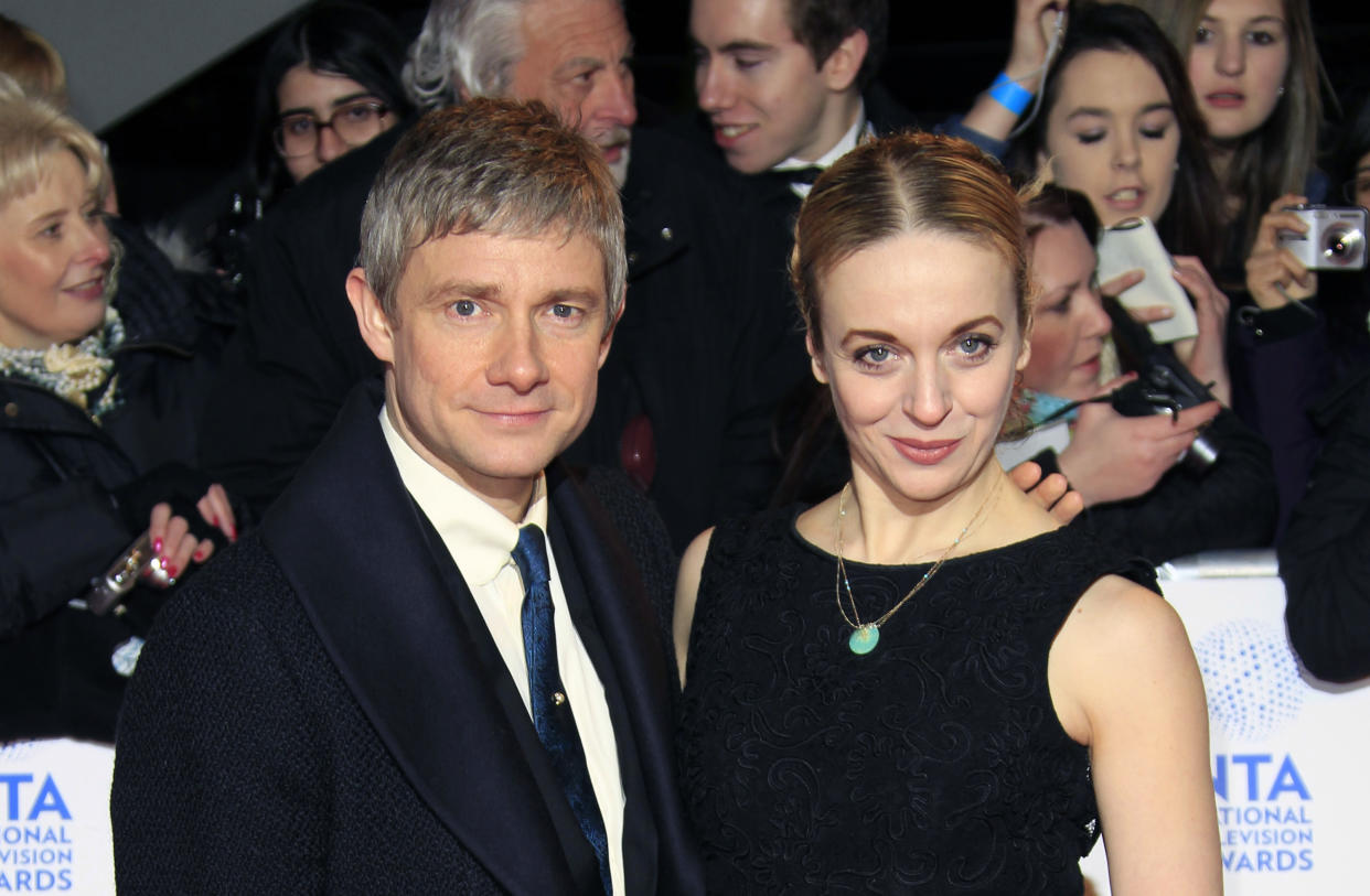 Martin Freeman, left, and Amanda Abbington seen at the National Television Awards at the o2 Arena on Wednesday, Jan. 23, 2013, in London. (Photo by Joel Ryan/Invision/AP)