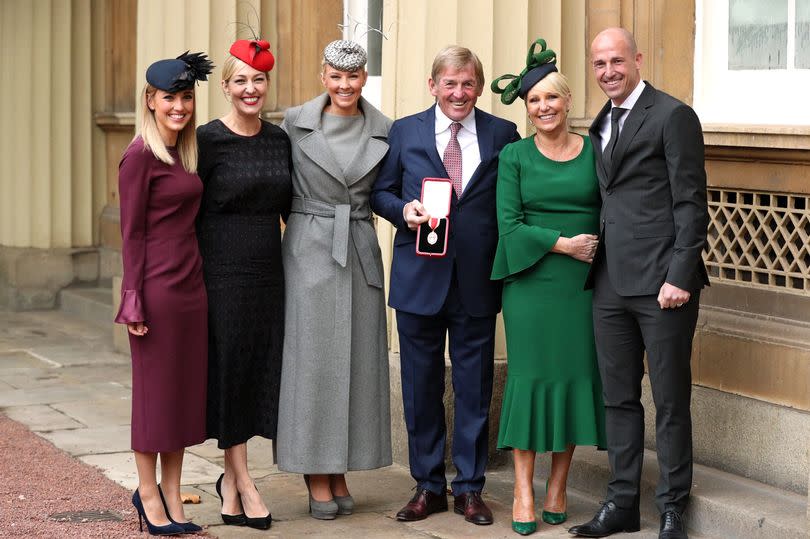 Former footballer and manager Sir Kenny Dalglish poses with (L-R) his daughters Lauren Dalglish, Kelly Cates and Lynsey Robinson and wife Marina Dalglish and son Paul Dalglish after being knighted at an investiture ceremony at Buckingham Palace on November 16, 2018 in London, England.