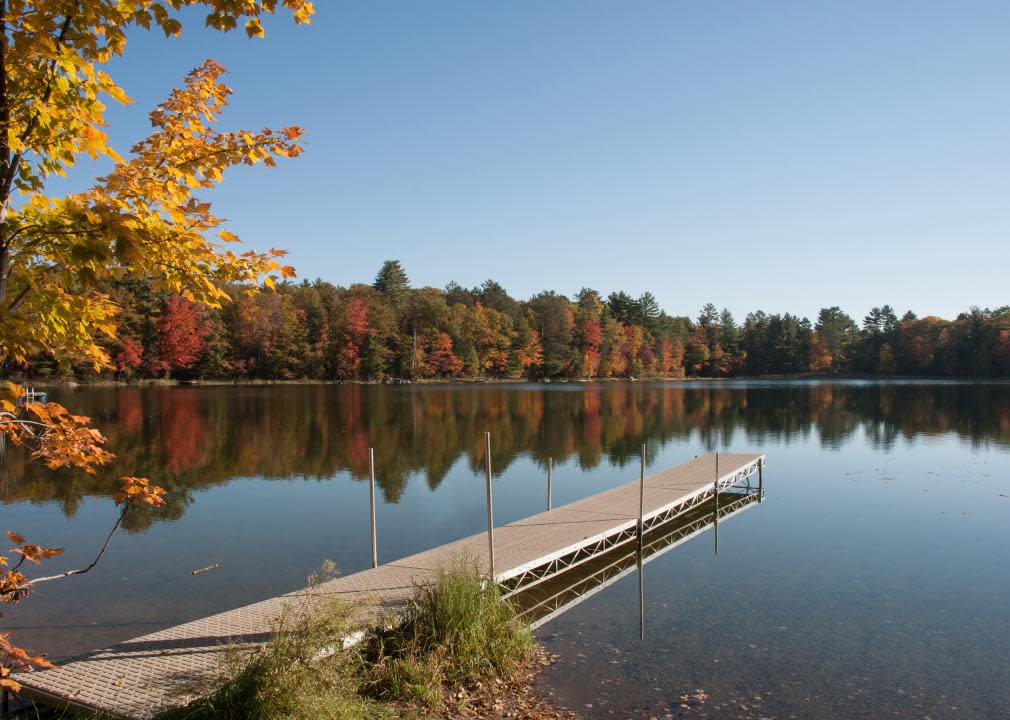 Reflection of autumn forest in a lake.