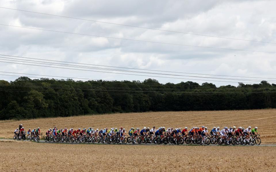 A general view of the peloton passing through a landscape during the Men's Road Race on day eight of the Olympic Games Paris 2024.