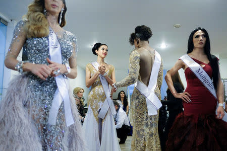 Contestants prepare backstage before the final show of the Miss International Queen 2016 transgender/transsexual beauty pageant in Pattaya, Thailand, March 10, 2017. REUTERS/Athit Perawongmetha