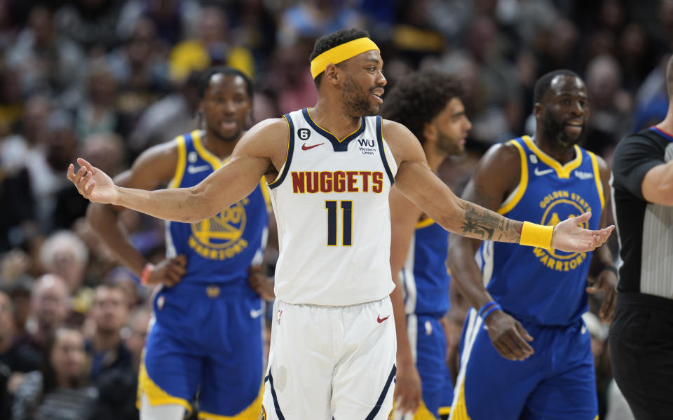 Denver Nuggets forward Bruce Brown argues with referees after being called for a foul in the first half of an NBA basketball game against the Golden State Warriors, Sunday, April 2, 2023, in Denver. (AP Photo/David Zalubowski)