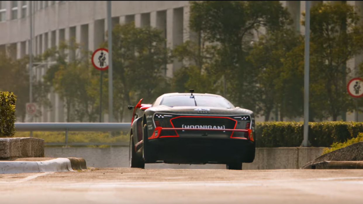 a black audi rally car on a road