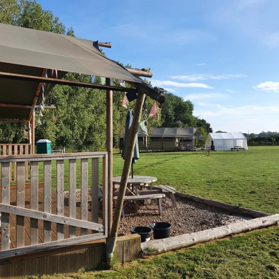 Gazette: Dining - An outside eating area at the Woodchests Glamping campsite