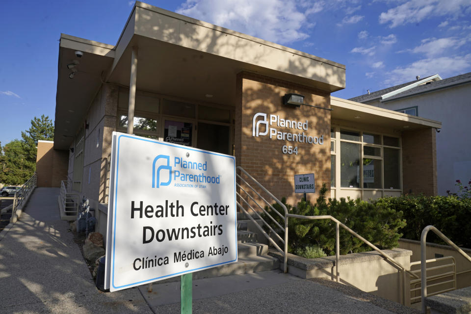 FILE - Planned Parenthood of Utah is shown on June 28, 2022, in Salt Lake City. A Utah court on Friday, April 28, 2023, will consider a request from Planned Parenthood to delay implementing a statewide ban on abortion clinics set to begin taking effect next week. The organization in a motion filed earlier this month argued a state law passed earlier this year will severely curtail access to abortion in Utah. (AP Photo/Rick Bowmer, File)