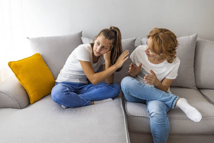 a mother and daughter arguing