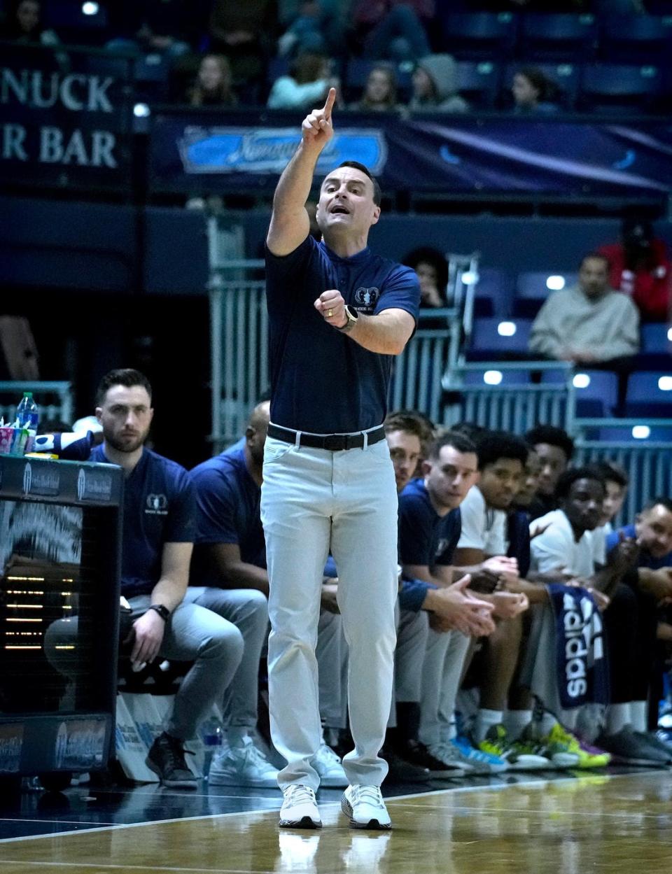 URI Head Coach Archie Miller, instructs his players from the sidelines Wednesday night.