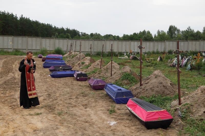 Mass burial of unidentified people killed during Russian invasion in Bucha