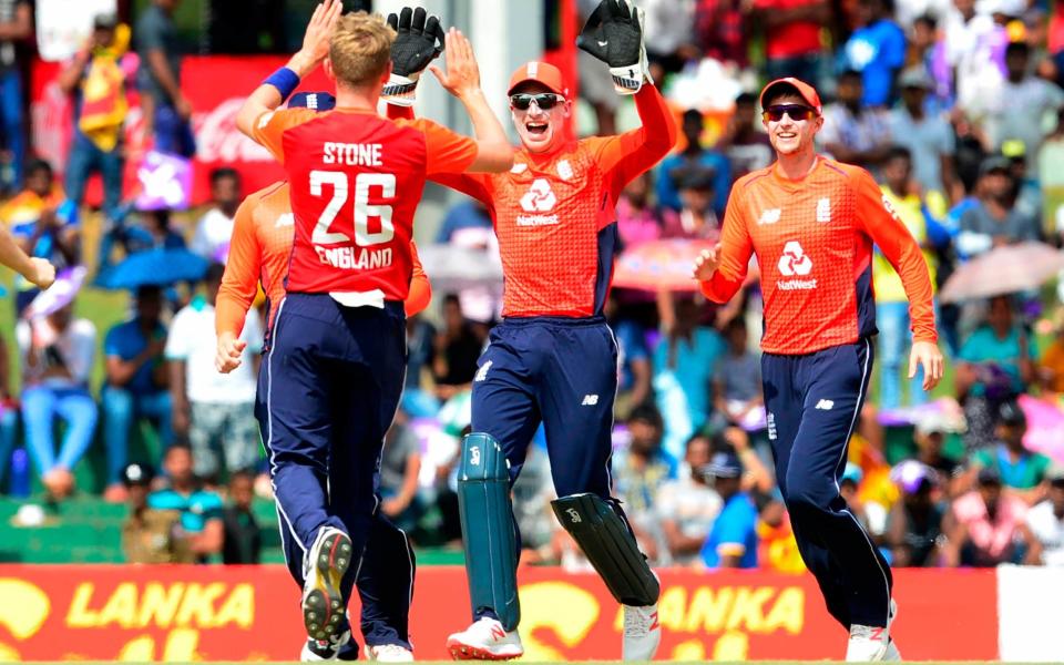 Olly Stone (left) celebrates with his team-mates after he dismisses Niroshan Dickwella - AFP