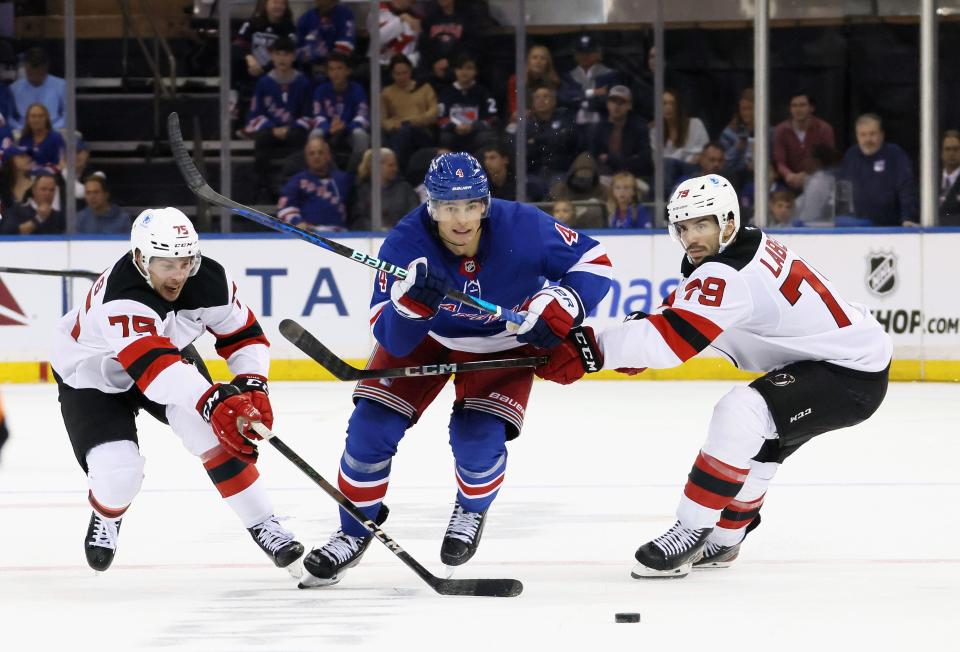 NEW YORK, NEW YORK - OCTOBER 01: Braden Schneider #4 of the New York Rangers skates against the New Jersey Devils during the second period at Madison Square Garden on October 01, 2024 in New York City.