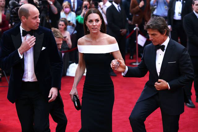 DAN KITWOOD/POOL/AFP/Getty Prince William, Kate Middleton and Tom Cruise in 2022