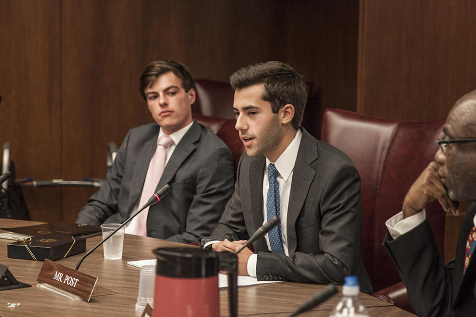 Eric Guerci, left, and Matt Post, right, participate in a school board meeting in Montgomery County, Maryland. Guerci, now a student at Princeton University, and Post, now a student at Yale University, served as student members of the county school board. (Photo courtesy Matt Post)