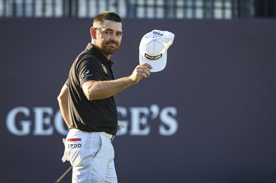 Pictured here, Louis Oosthuizen salutes fans after his second round at The Open.