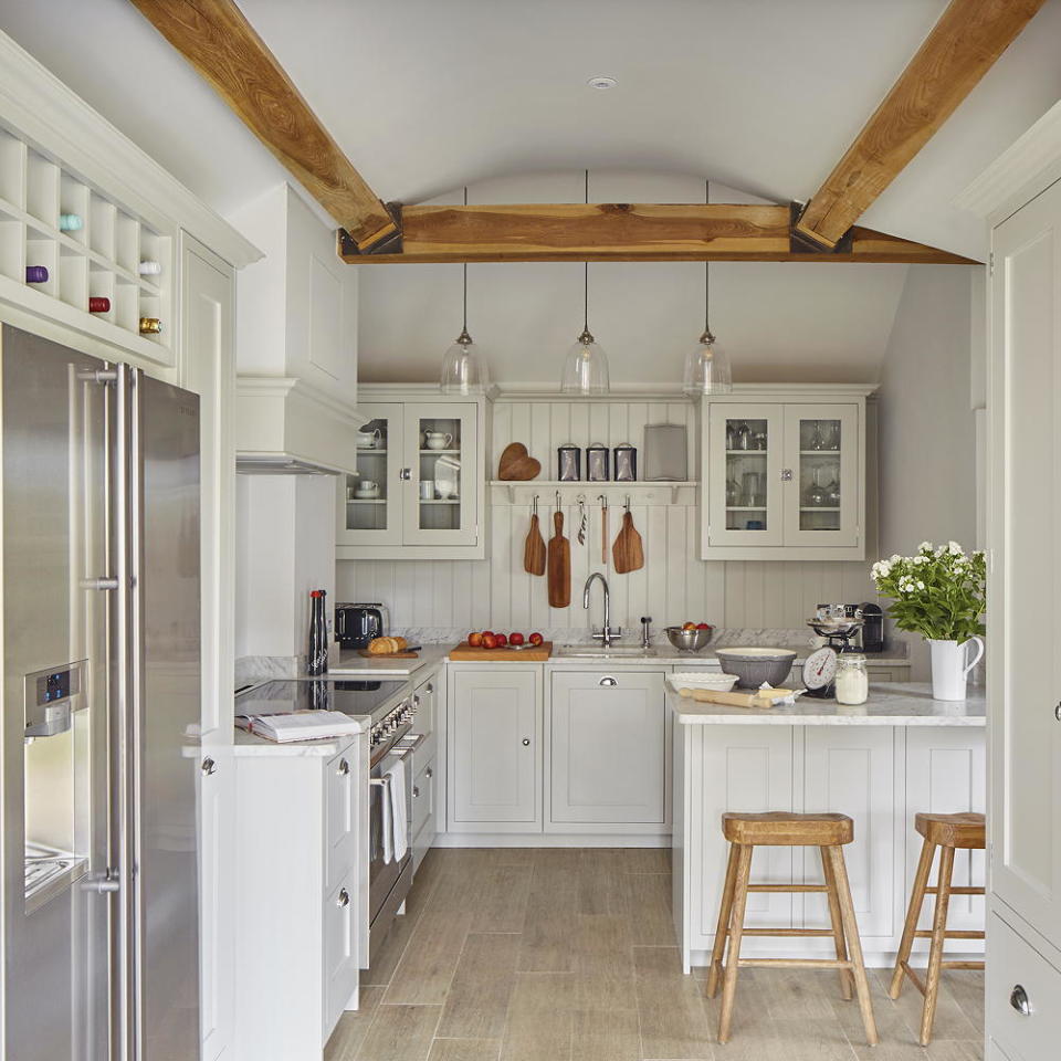 Paint cabinetry to match the walls