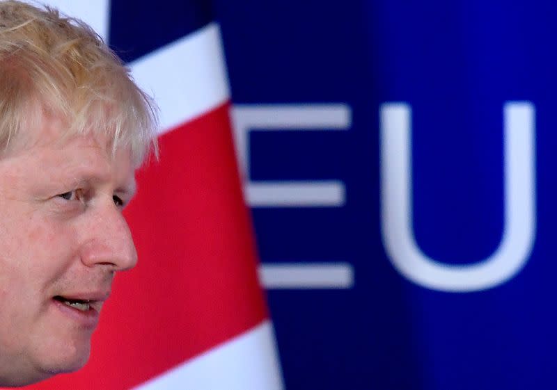 FILE PHOTO: Britain's Prime Minister Boris Johnson arrives to attend a news conference at the European Union leaders summit dominated by Brexit, in Brussels, Belgium October 17, 2019