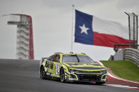 William Byron steers through Turn 10 during a NASCAR Cup Series auto race on Sunday, March 24, 2024, at Circuit of the Americas in Austin, Texas. (AP Photo/Darren Abate)