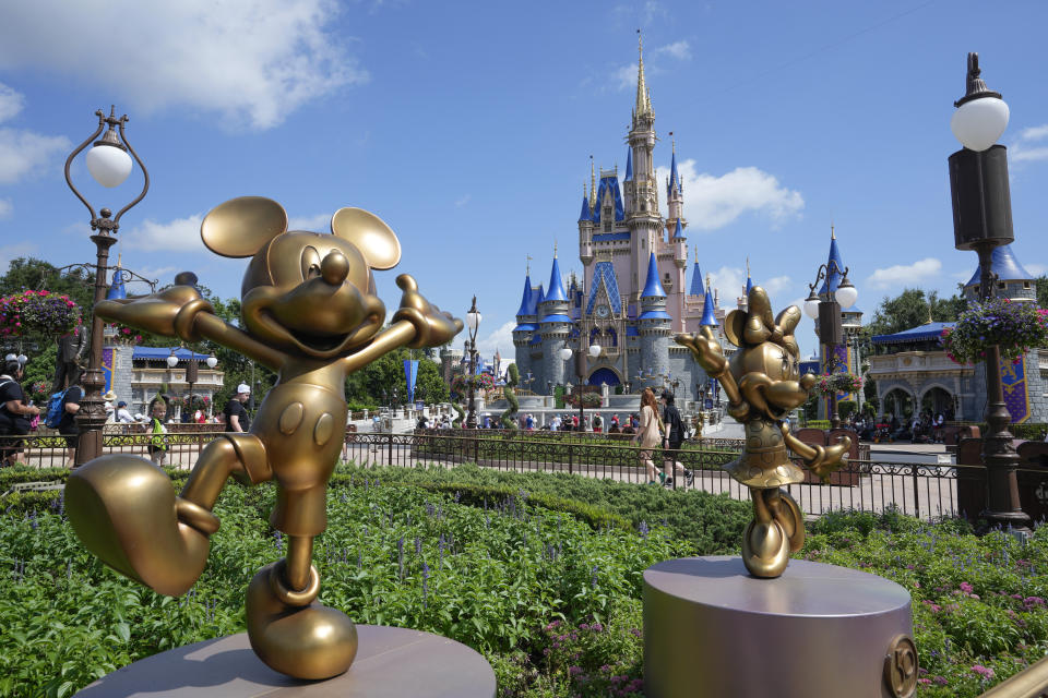 FILE - The Cinderella Castle is seen at the Magic Kingdom at Walt Disney World, July 14, 2023, in Lake Buena Vista, Fla. Allies of Florida Gov. Ron DeSantis and Disney reached a settlement agreement Wednesday, March 27, 2024, in a lawsuit over who controls Walt Disney World’s governing district.(AP Photo/John Raoux, File)