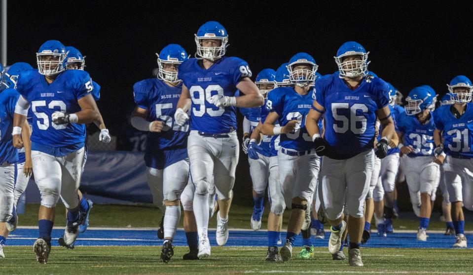 Shore Regional 99n Jackson Whitacre leads his team out after halftime. Manasquan high school football defeats Shore Regional 14-7 in West Long Branch NJ on August 25, 2023.