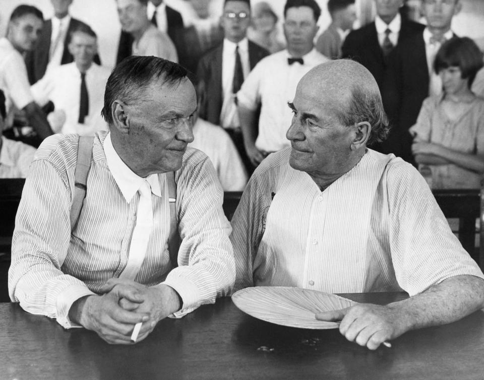 Clarence Darrow, a famous Chicago lawyer, and William Jennings Bryan, defender of Fundamentalism, have a chat in a courtroom during the Scopes evolution trial in 1925.