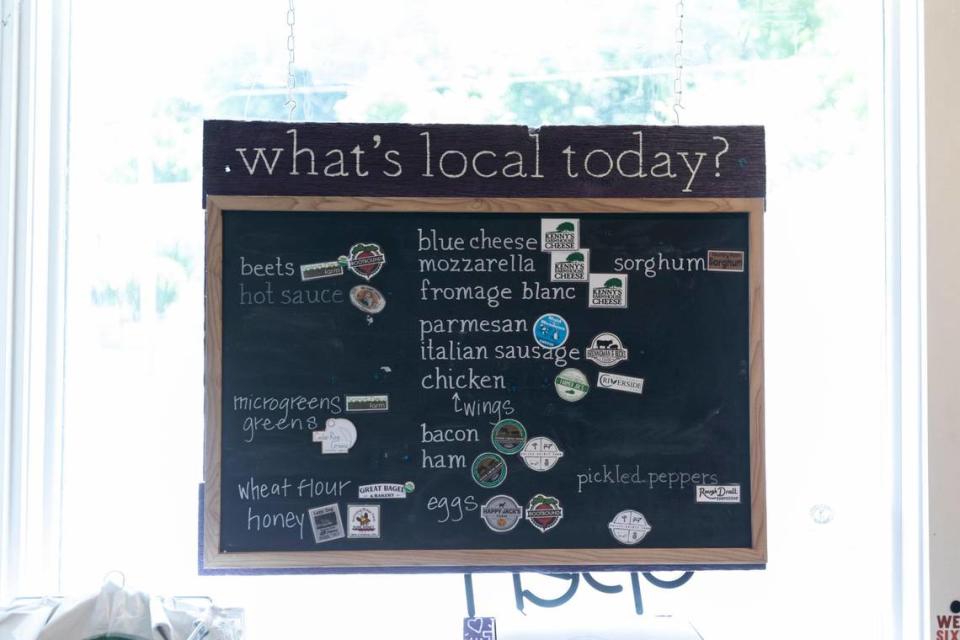 The menu at Locals Food Hub & Pizza Pub offers options all made with produces from local farms throughout Kentucky in Frankfort, Ky., June 16, 2023.