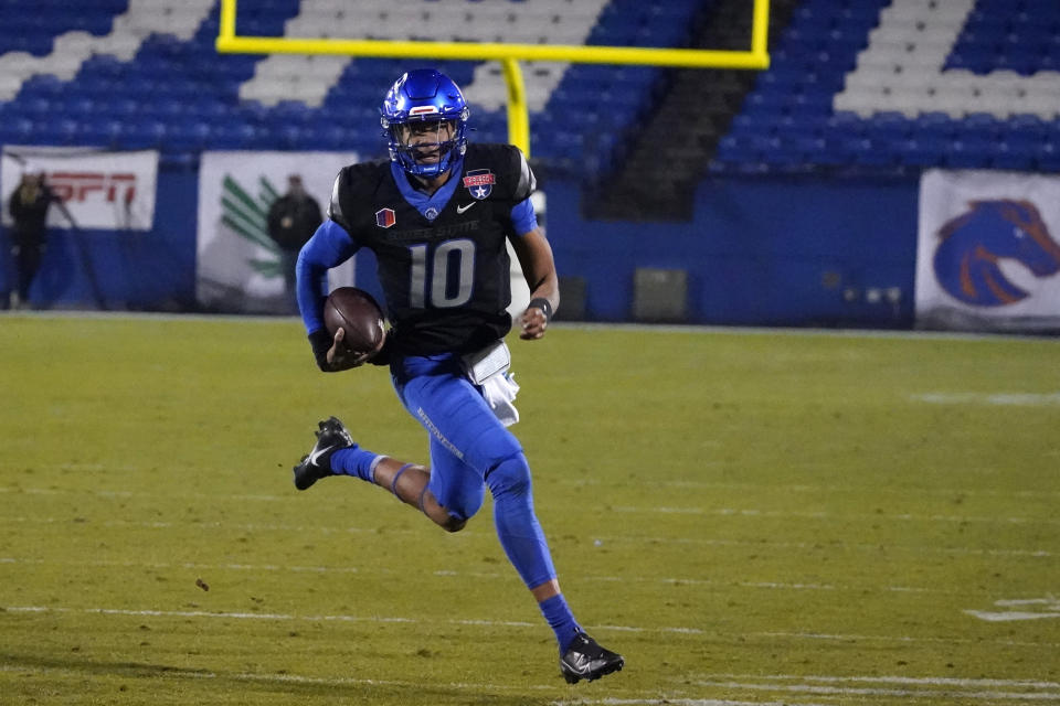 Boise State quarterback Taylen Green (10) finds open field as he rushes to score a touchdown during the second half of the Frisco Bowl NCAA college football game against North Texas Saturday, Dec. 17, 2022, in Frisco, Texas. (AP Photo/LM Otero)