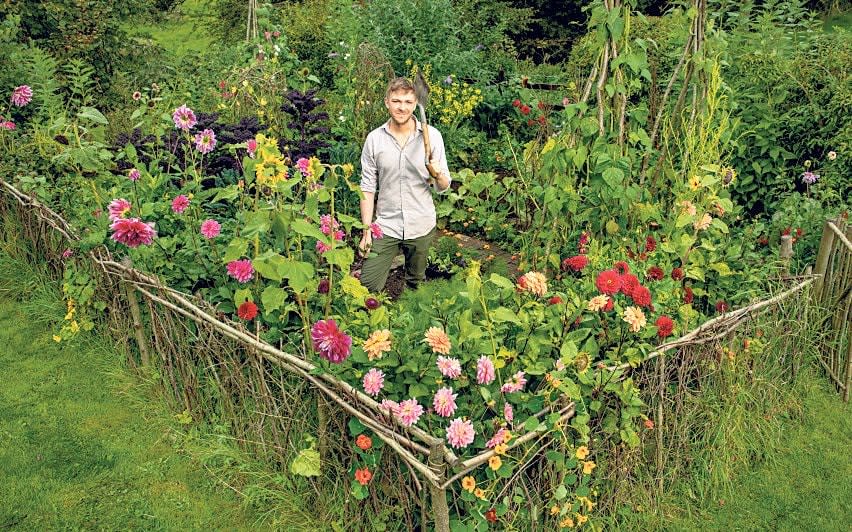 ‘It was hard graft to clear the site, with huge lumps of stone to dig out’: Robin Lucas had this work cut out when renovating his garden  - Paul Cooper 