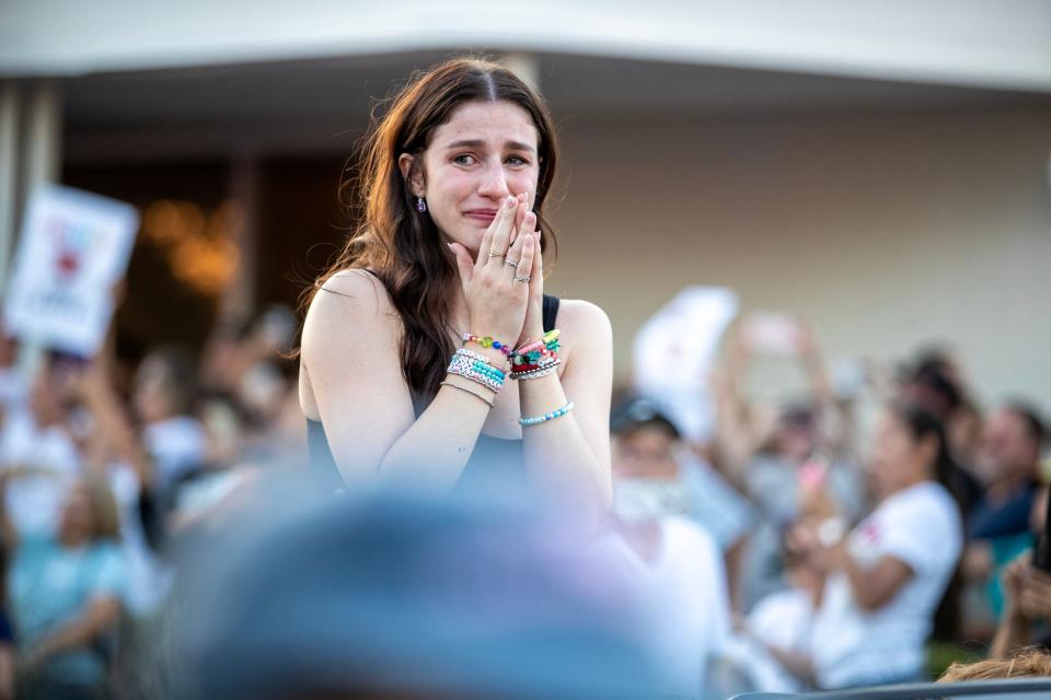 "American Idol" winner Abi Carter reacts during a parade for the musician in downtown Indio, California.