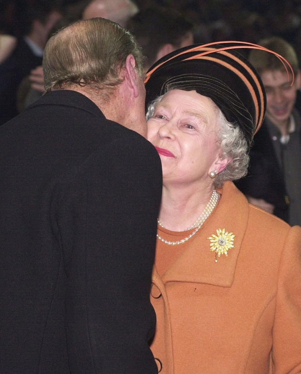 <div class="inline-image__caption"><p>In a rare moment of PDA, Prince Philip kisses Queen Elizabeth II during the New Year’s Eve celebration at the Millennium Dome on Dec. 31, 1999, in London, England.</p></div> <div class="inline-image__credit">Anwar Hussein/Getty</div>