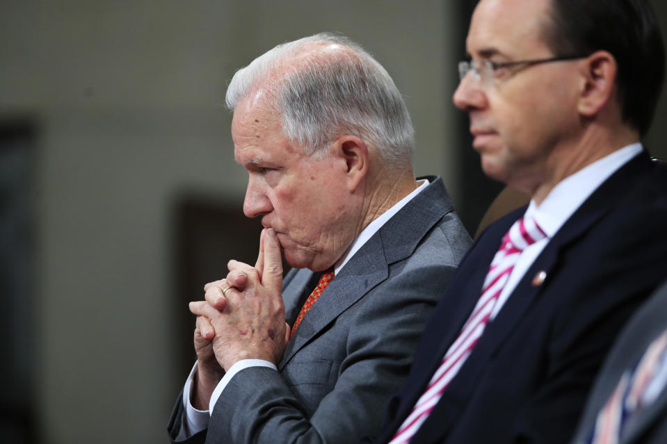 Attorney General Jeff Sessions, left, and Deputy Attorney General Rod Rosenstein, listen to remarks during a Religious Liberty Summit at the Department of Justice, Monday, July 30, 2018. Sessions says there’s a “dangerous movement” to erode protections for Americans to worship and believe as they choose. (AP Photo/Manuel Balce Ceneta)