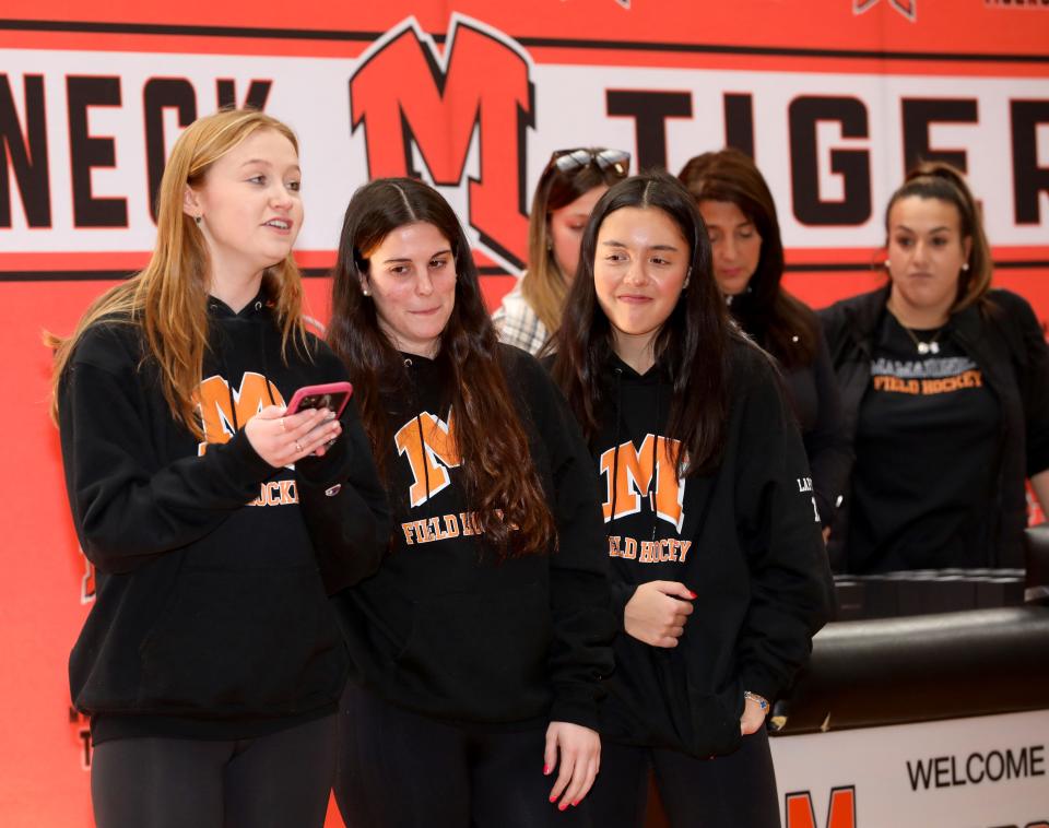 Mamaroneck High School field hockey captains Juliette Patricot, Daniella Maresca and Bella LaPorta, share their thoughts during a championship ring ceremony at the school Jan. 12, 2024. The were celebrating their 2023 New York State Championship where they defeated Orchard Park, 4-0 on Nov. 12, 2023.
