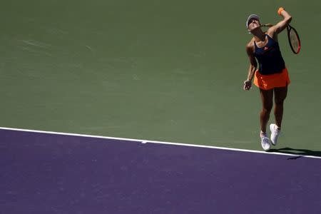 Mar 26, 2017; Miami, FL, USA; Angelique Kerber of Germany serves against Shelby Rogers of the United States (not pictured) on day six of the 2017 Miami Open at Crandon Park Tennis Center. Kerber won 6-4, 7-5. Mandatory Credit: Geoff Burke-USA TODAY Sports