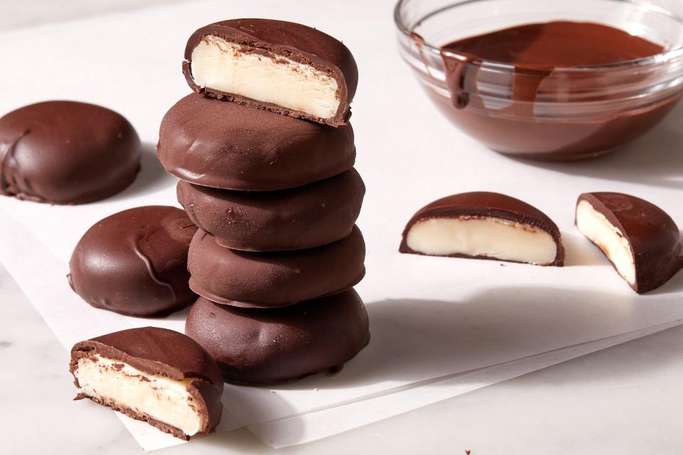 <p>Peppermint Patties were developed in 1940 at a store in York, Pennsylvania. The guy behind the York Cone Company, Henry Kessler, made sure the patties had that perfect “snap.” The company became one with Hershey in the late 1980s, and the candy is synonymous with the brand. The more you know!</p><p>Get the <strong><a href="https://www.delish.com/cooking/recipe-ideas/a41232930/peppermint-patties-recipe/" rel="nofollow noopener" target="_blank" data-ylk="slk:Peppermint Patties recipe;elm:context_link;itc:0;sec:content-canvas" class="link ">Peppermint Patties recipe</a></strong>.</p>