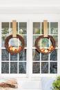 <p>How beautiful are these fall wreaths? They happen to be incredibly easy to throw together too. Simply add <a href="https://www.amazon.com/MotBach-Realistic-Artificial-Simulation-Decoration/dp/B07YW72DJC/ref=sr_1_1_sspa?tag=syn-yahoo-20&ascsubtag=%5Bartid%7C10050.g.22628923%5Bsrc%7Cyahoo-us" rel="nofollow noopener" target="_blank" data-ylk="slk:faux apples;elm:context_link;itc:0;sec:content-canvas" class="link ">faux apples</a> to a grapevine wreath or two.</p><p><a class="link " href="https://www.amazon.com/Redbaker-Christmas-Grapevine-Natural-Wreaths/dp/B09DKWK6L6/ref=sr_1_3_sspa?tag=syn-yahoo-20&ascsubtag=%5Bartid%7C10050.g.22628923%5Bsrc%7Cyahoo-us" rel="nofollow noopener" target="_blank" data-ylk="slk:SHOP GRAPEVINE WREATHS;elm:context_link;itc:0;sec:content-canvas">SHOP GRAPEVINE WREATHS</a></p>