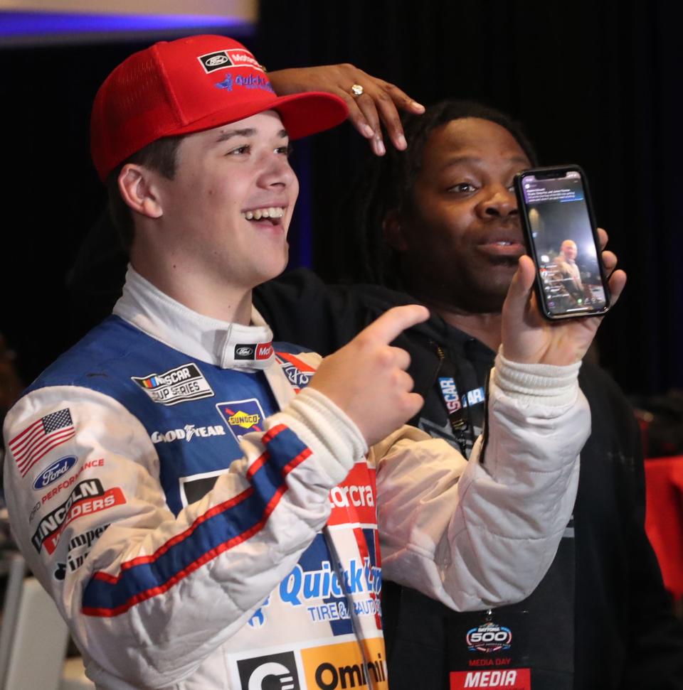 Harrison Burton  shoots a TikTok video, Wednesday February 16, 2022 during NASCAR Media day in the Daytona 500 Club at Daytona International Speedway.