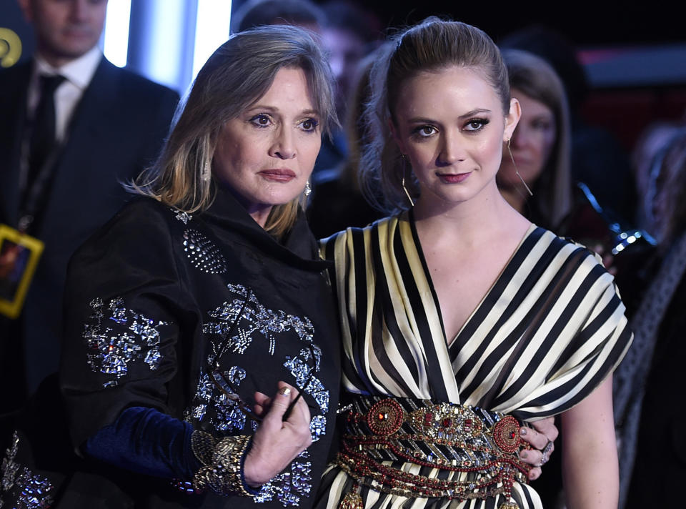 FILE- In this Dec. 14, 2015, file photo, Carrie Fisher, left, and daughter Billie Lourd arrive at the world premiere of "Star Wars: The Force Awakens" at the TCL Chinese Theatre in Los Angeles. Lourd says the support she’s received since the death of her mother and her grandmother, Debbie Reynolds, has given her strength. (Photo by Jordan Strauss/Invision/AP, File)