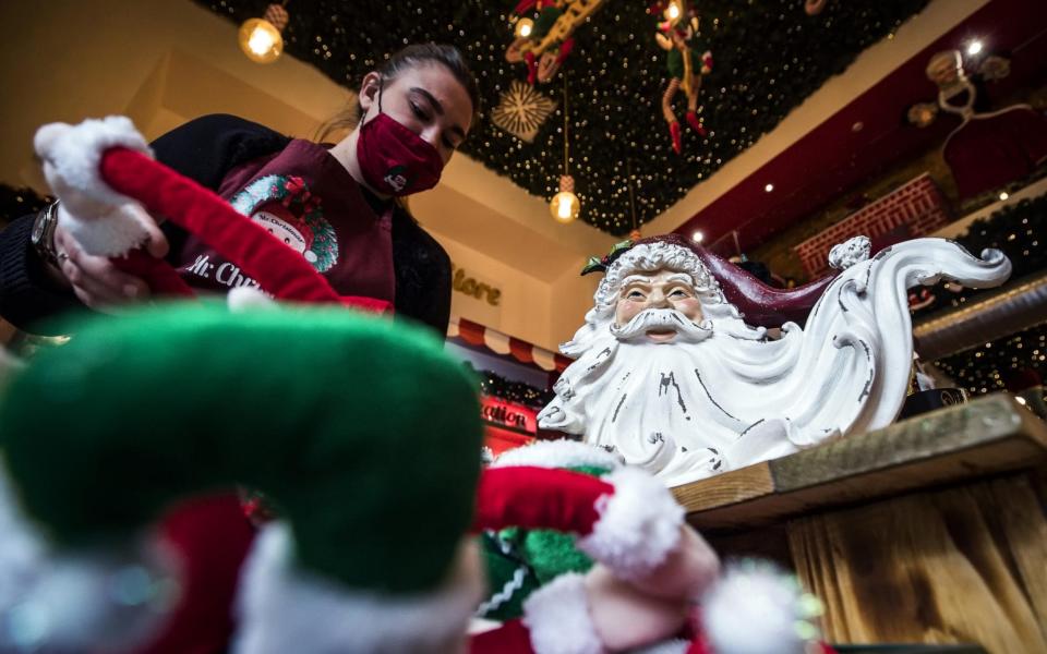 Mandatory Credit: Photo by ANGELO CARCONI/EPA-EFE/Shutterstock (11019723e) Christmas decorations on display in a shop during the Coronavirus Covid-19 pandemic emergency in Rome, Italy, 17 November 2020. Christmas decorations on display in a shop in Rome, Roma, Italy - 17 Nov 2020 - ANGELO CARCONI/EPA-EFE/Shutterstock