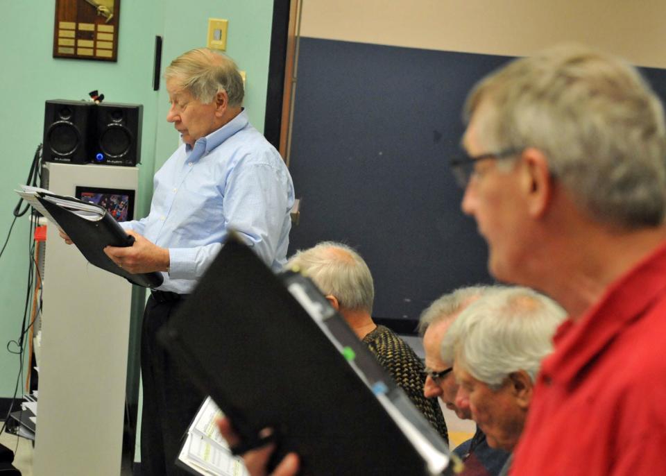 Snug Harbor Community Chorus members Walter Hempel, left, and Fred Boericke, both of Duxbury, rehearse for their upcoming 25th anniversary concert at the Duxbury Performing Arts Center. Monday, May 3, 2022.