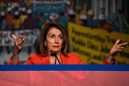 House Speaker Nancy Pelosi (D-CA) addresses the North America's Building Trades Unions (NABTU) 2019 legislative conference in Washington, U.S., April 9, 2019. REUTERS/Jeenah Moon/Files