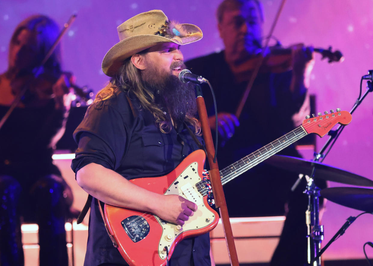 Chris Stapleton sings onstage.