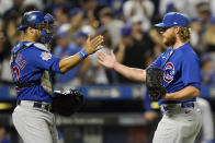 Chicago Cubs catcher Willson Contreras, left, congratulates relief pitcher Craig Kimbrell after they defeated the New York Mets in a baseball game, Thursday, June 17, 2021, in New York. (AP Photo/Kathy Willens)