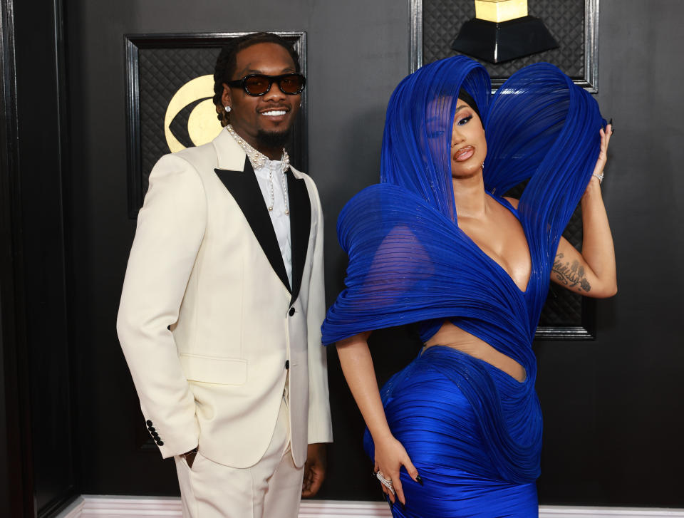 Offset Wearing White Suit And Cardi B Wearing Blue Dress 